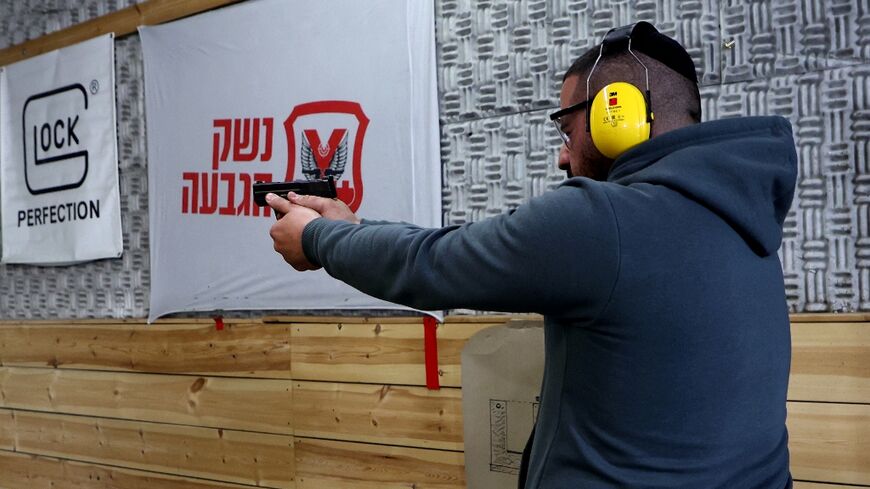 Increasingly fearful of surging violence, some Israelis decided to get a gun licence