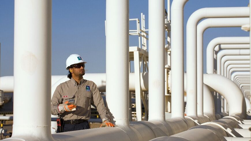 A handout picture provided by Energy giant Saudi Aramco, Saudi Arabia's Oil Company, shows one of its engineers at Yanbu refinery on January 16, 2011 