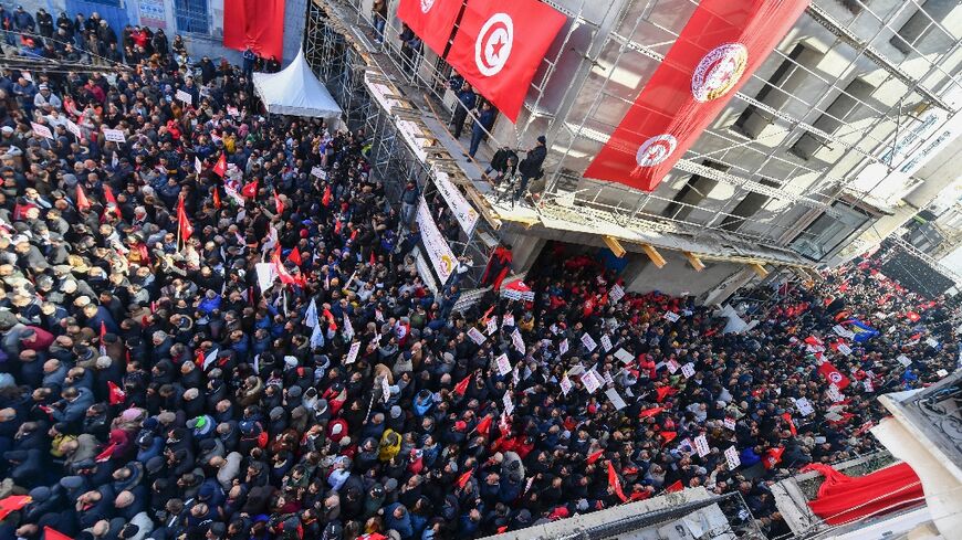 Tunisian demonstrators take part in an anti-government protests called for by the powerful UGTT trade union 