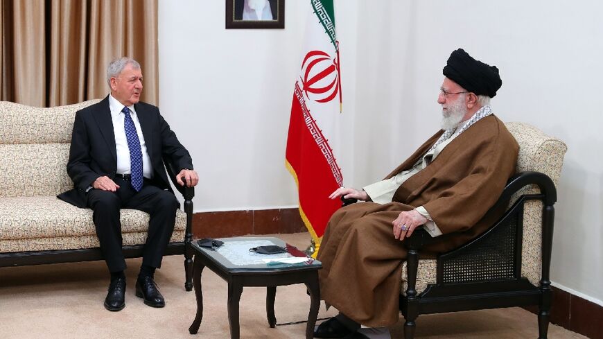 "Even the presence of one American in Iraq is too much" - Ayatollah Ali Khamenei (R) to Iraqi President Abdul Latif Rashid