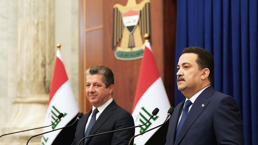 Iraqi Prime Minister Mohammed Shia al-Sudani, on the right, at a joint press conference with his Kurdish counterpart Masrour Barzani in Baghdad
