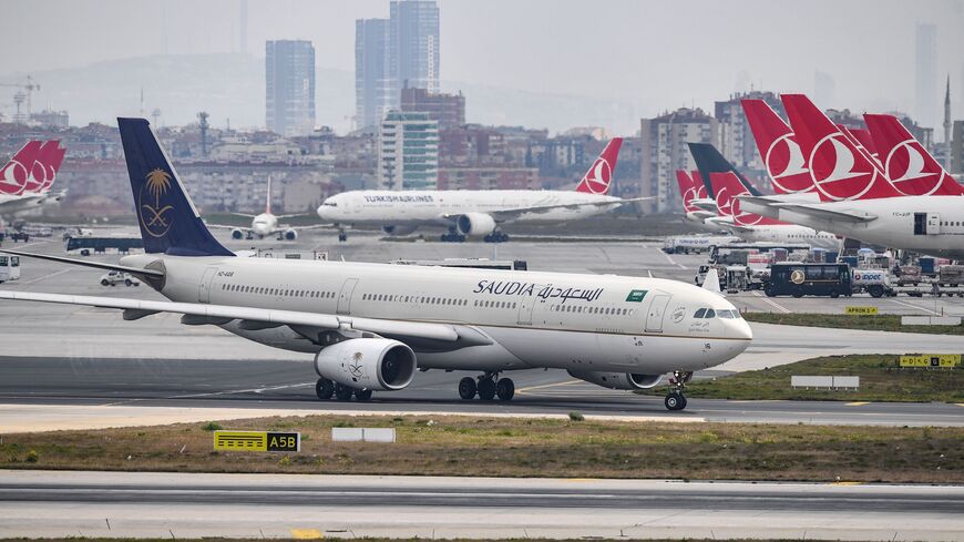 A Saudi Arabian Airlines Saudia plane is pictured on the tarmac of the Ataturk Airport on April 4, 2019, in Istanbul. - A transfer of Istanbul's Ataturk airport operations to its new international facility will begin at April 6 early morning. (Photo by OZAN KOSE / AFP) (Photo credit should read OZAN KOSE/AFP via Getty Images)