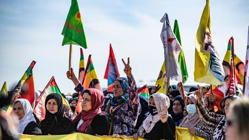 Kurdish Syrians protest the death of victims reportedly killed in a Turkish drone bombing the previous day, on Nov. 10, 2021 in the Syrian Kurdish-majority city of Qamishli. 