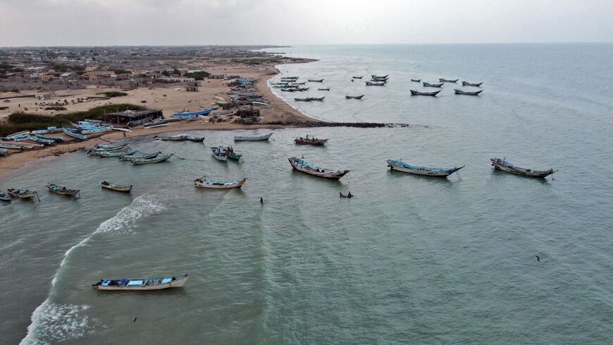 A picture taken on February 21, 2022 shows fishing boats off a beach on Yemen's Red Sea coast in the Khokha district of the war-ravaged country's western province of Hodeida. (Photo by Khaled Ziad / AFP) (Photo by KHALED ZIAD/AFP via Getty Images)