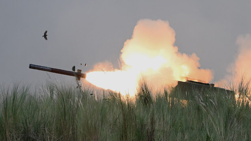 This photo shows the M142 High Mobility Artillery Rocket System (HIMARS) firing during the Combined Arms Live Fire Exercise (CALFEX) as part of the annual naval exercises between the Philippine Marine Corps and US Marine Corps at Capas, Tarlac province on October 13, 2022. (Photo by JAM STA ROSA / AFP) (Photo by JAM STA ROSA/AFP via Getty Images)