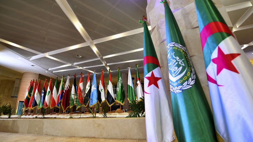 Flags of Arab League nations are set up at the convention center slated to host the league's Heads of State summit, in Algeria capital Algiers, on October 30, 2022. - Arab leaders are to meet in the Algerian capital on November 1 for their first summit since a string of normalisation deals with Israel that have divided the region. (Photo by Fethi Belaid / AFP) (Photo by FETHI BELAID/AFP via Getty Images)