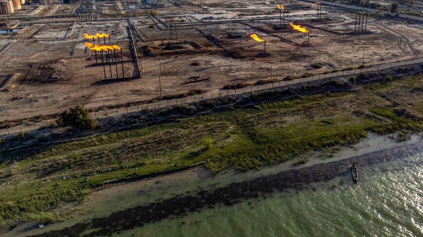 A picture taken on April 4, 2023 shows the Nahr Bin Omar oil field and facility near Iraq's southern port city of Basra. - Major oil powers led by Saudi Arabia announced a surprise production cut of more than one million barrels per day on April 2, calling it a "precautionary" move aimed at stabilising the market. (Photo by Hussein FALEH / AFP) (Photo by HUSSEIN FALEH/AFP via Getty Images)