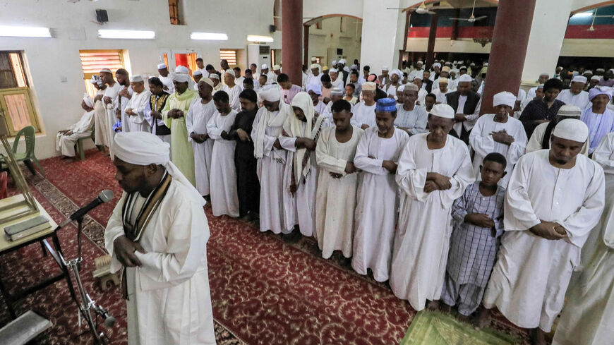 Muslim worshippers pray on the first day of Eid al-Fitr, which marks the end of the holy fasting month of Ramadan, at al-Hara al-Rabaa Mosque in the Juraif Gharb neighborhood, Khartoum, Sudan, April 21, 2023.