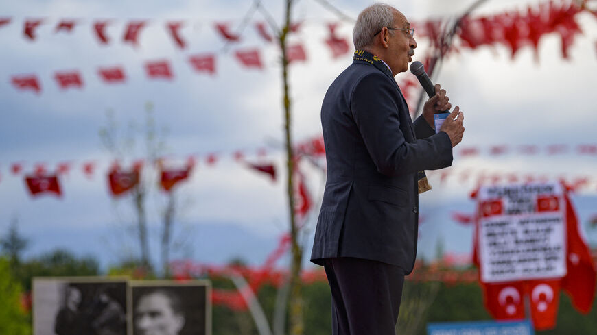 Turkey's Republican People's Party (CHP) Chairman and Presidential candidate Kemal Kilicdaroglu speaks on the stage during a rally in Kocaeli, on April 28, 2023. - A sea of umbrellas and hoods at his feet, Kemal Kilicdaroglu, the Turkish opposition candidate who will challenge Recep Tayyip Erdogan at the polls on 14 May, smilingly promises "the return of spring". (Photo by Yasin AKGUL / AFP) (Photo by YASIN AKGUL/AFP via Getty Images)
