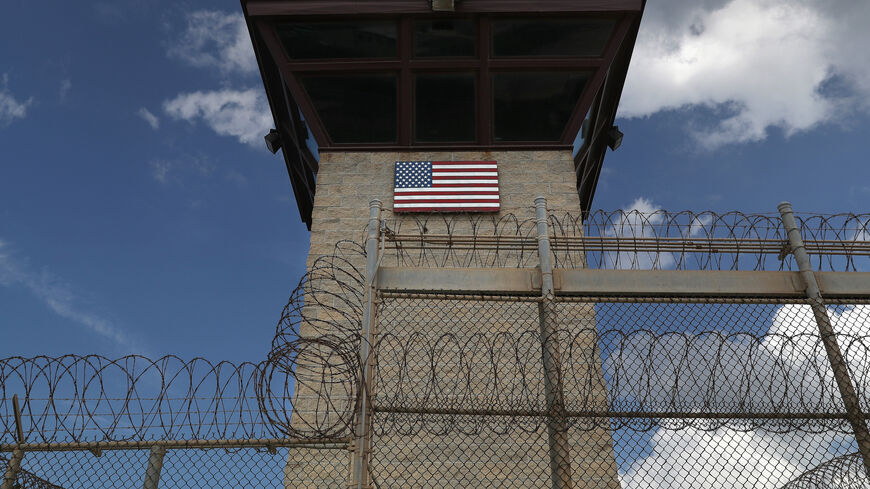 A guard tower stands at the entrance of the US prison at Guantanamo Bay.