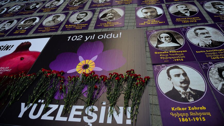 Portraits of Armenian intellectuals, detained and deported in 1915, are displayed during a rally on the Istiklal avenue in Istanbul, on April 24, 2017 to commemorate the 102nd anniversary of the 1915 mass killing of Armenians in the Ottoman Empire. 