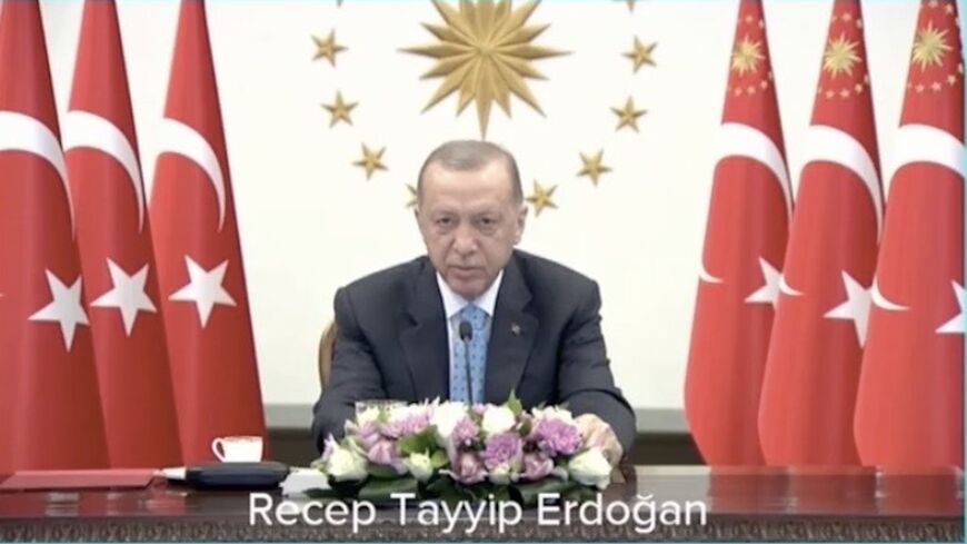 Turkish President Recep Tayyip Erdogan speaks via a video link at the opening of Turkey’s first nuclear power plant in Turkey’s Mediterranean port city of Mersin, April 27, 2023.