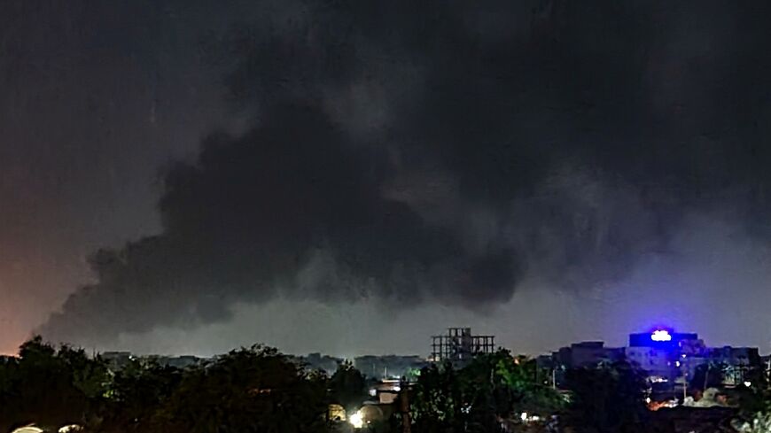 Smoke rises over Khartoum as more than one month of fighting between forces loyal to rival generals continues unabated