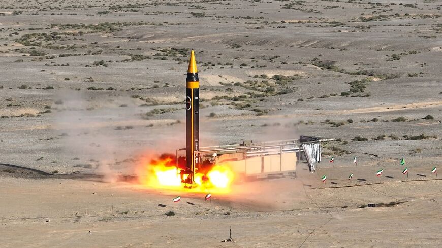 A handout picture provided by Iran's Defence Ministry shows the testing of the fourth generation Khorramshahr ballistic missile, named Khaibar