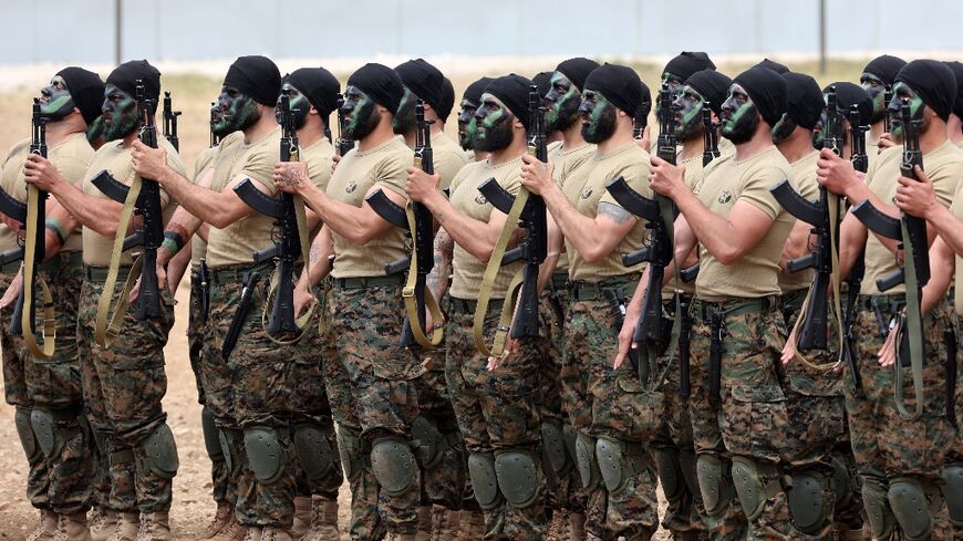 Fighters from Lebanon's Hezbollah Iran-backed militant group hold military drills in southern Lebanon including mock raids against Israel