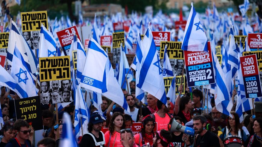 Thousands of Israelis march through Jerusalem to protest against controversial cash handouts to ultra-Orthodox Jews in the annual budget
