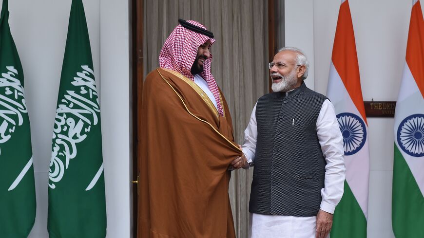 Indian Prime Minister Narendra Modi (R) shakes hands with Saudi Crown Prince Mohammed bin Salman prior to a meeting at Hyderabad House in New Delhi on February 20, 2019. - Saudi Arabia's Crown Prince Mohammed bin Salman received a warm welcome in India on February 20, with Riyadh eager to demonstrate it is not an international pariah after the murder of journalist Jamal Khashoggi in October. (Photo by MONEY SHARMA / AFP) (Photo credit should read MONEY SHARMA/AFP via Getty Images)