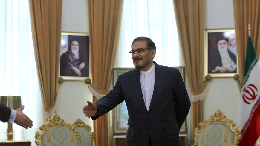Ali Shamkhani (R), the secretary of the Supreme National Security Council of Iran extends his hand to Emmanuel Bonne (L), diplomatic advisor to the French president, in the Iranian capital Tehran on July 10, 2019. - Iran has breached a uranium enrichment cap set by a troubled 2015 nuclear deal and warned Europe against taking retaliatory measures, as France decided to send an envoy to Tehran to try to calm tensions. (Photo by ATTA KENARE / AFP) (Photo credit should read ATTA KENARE/AFP via Getty Images)