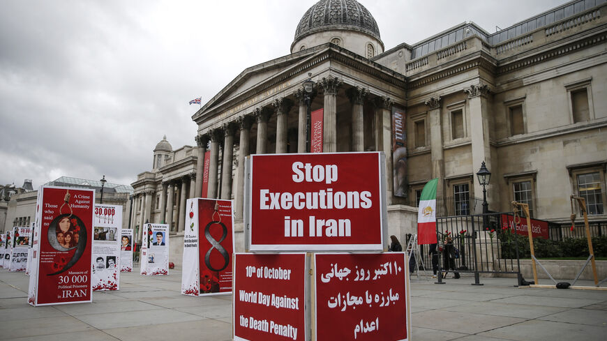 An exhibition calling for an end to executions in Iran on Trafalgar Square on October 10, 2020 in London, England. The exhibition, held by Anglo-Iranian communities in the UK, marked the World Day against the Death Penalty. (Photo by Hollie Adams/Getty Images)