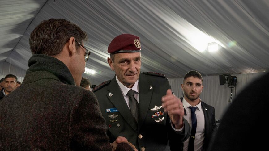 Israel's new army chief of staff Herzi Halevi (C) speaks to a supporter following his official appointment ceremony in Jerusalem, on January 16, 2023. (Photo by Maya Alleruzzo / POOL / AFP) (Photo by MAYA ALLERUZZO/POOL/AFP via Getty Images)