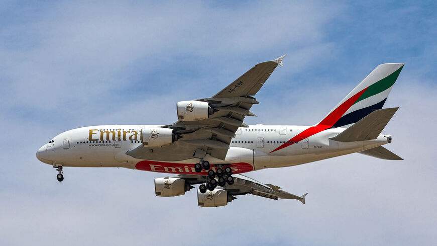 An Emirates Airbus A380 aircraft descends on its landing approach to Dubai International Airport, Dubai, United Arab Emirates, April 17, 2023.