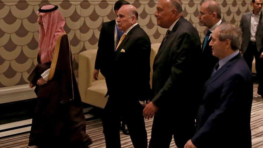 Saudi Arabia's Foreign Minister Faisal bin Farhan (L), Arab League Secretary-General Ahmed Aboul-Gheit, Egyptian Foreign Minister Sameh Shoukry, Syrian Foreign Minister Faisal Mekdad (R) arrive for a regional meeting on Syria, in Amman on May 1, 2023. - Arab foreign ministers will gather in Jordan on May 1, to discuss Syria's long-running conflict and ending Damascus's diplomatic isolation in the region, the foreign ministry in Amman said. (Photo by Khalil MAZRAAWI / AFP) (Photo by KHALIL MAZRAAWI/afp/AFP v