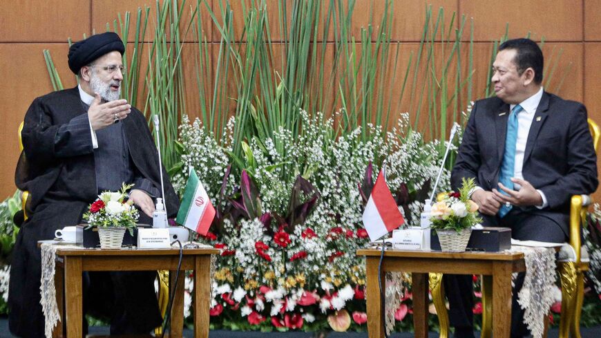 Chairman of the Indonesian People's Consultative Assembly Bambang Soesatyo (R) meets Iranian President Ebrahim Raisi (L) in Jakarta, on May 23, 2023, during Raisi two-day state visit to the most populous Muslim country. 