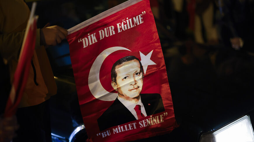 Supporters of Turkish President Recep Tayyip Erdogan celebrate.