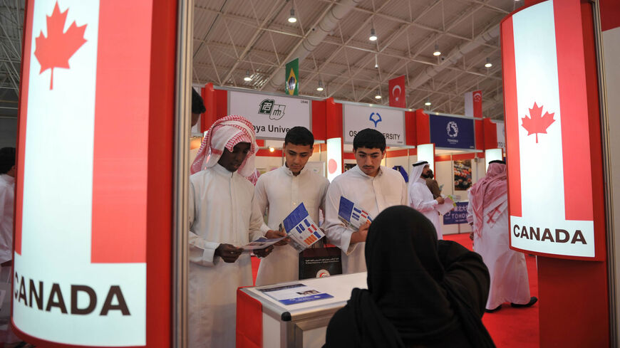 Saudi students visit booths of Canadian universities during the International Exhibition & Conference on Higher Education, Riyadh, Saudi Arabia, April 19, 2011.