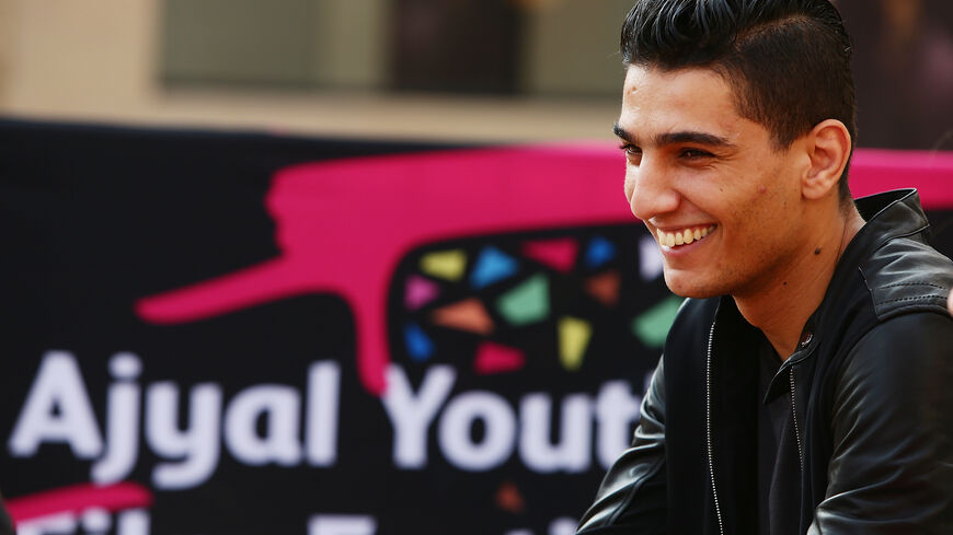 Arab Idol Winner (2012) Mohammed Assaf conducts interviews for The Idol co financed by the Doha Film Institute on day 2 of the Ajyal Youth Film Festival 2015 on November 30, 2015 in Doha, Qatar. (Photo by Vittorio Zunino Celotto/Getty Images)