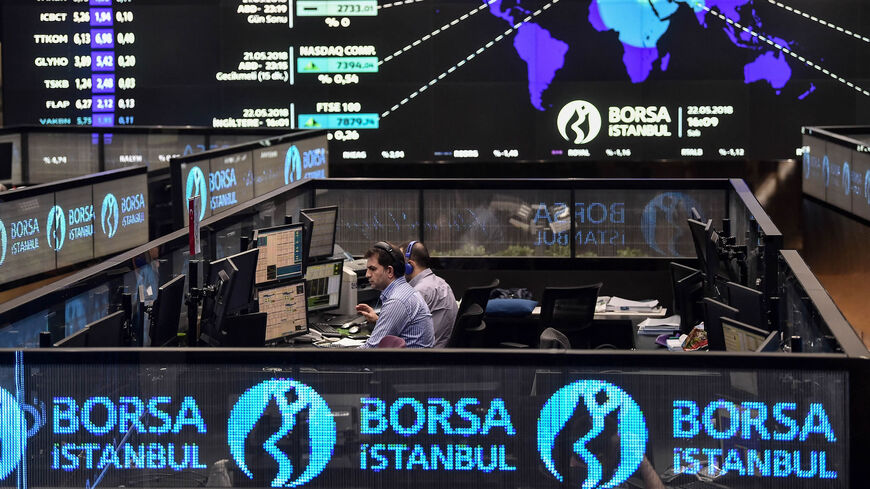 Traders work at their desks on the floor of the Borsa Istanbul in Istanbul, Turkey, May 22, 2018.