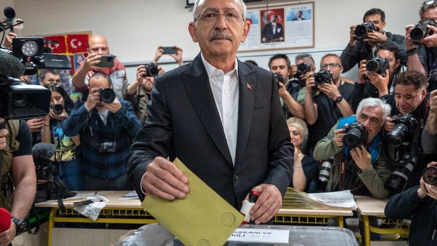 Opposition leader Kemal Kilicdaroglu pledged to restore democracy after casting his ballot