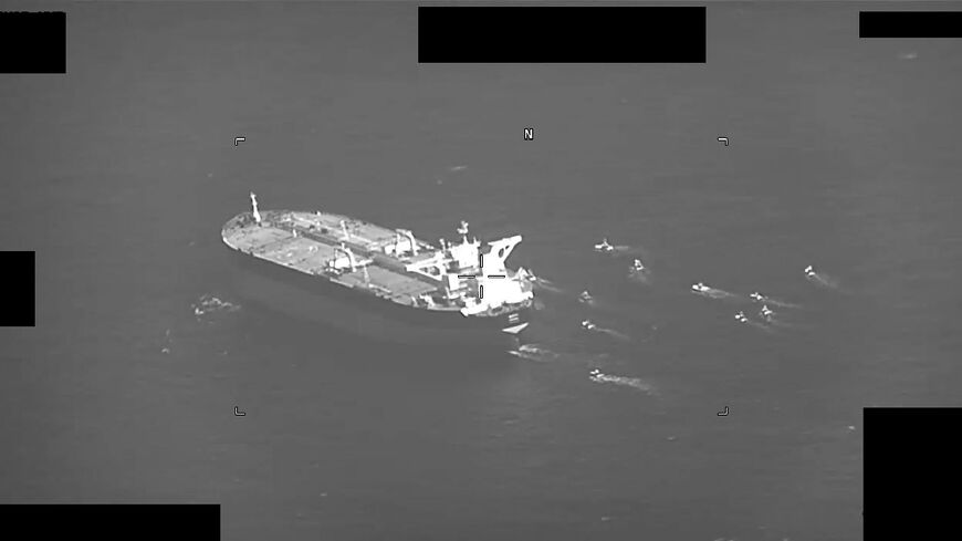 This US Navy handout screenshot of a video shows fast-attack craft from Iran's Islamic Revolutionary Guard Corps Navy swarming Greek-owned oil tanker Niovi as it transits the Strait of Hormuz