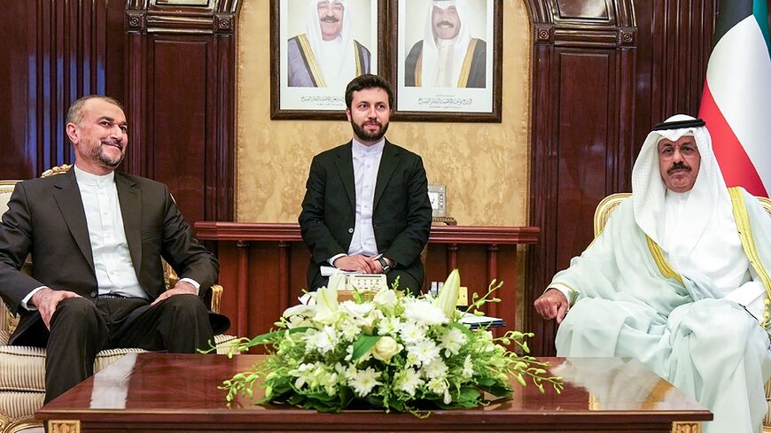 Kuwait's Prime Minister Sheikh Ahmad Nawaf al-Ahmad al-Sabah (R) meeting with Iran's Foreign Minister Hossein Amir-Abdollahian (L), in Kuwait City