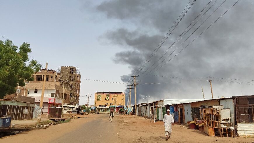 Smoke billows in southern Khartoum on June 12, 2023 where rival forces traded gunfire and shelling