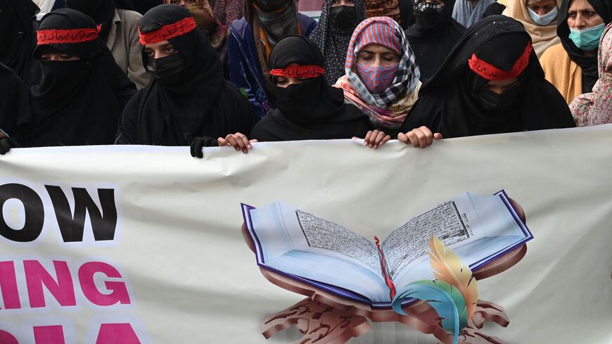 Women activists of Pakistan Markazi Muslim League take part in a protest rally in Lahore on Jan. 29, 2023.