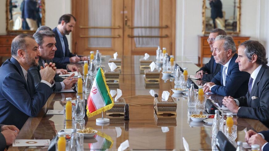 Iranian Foreign Minister Hossein Amir-Abdollahian (L) meets with International Atomic Energy Agency (IAEA) chief Rafael Grossi in Tehran on March 4, 2023.