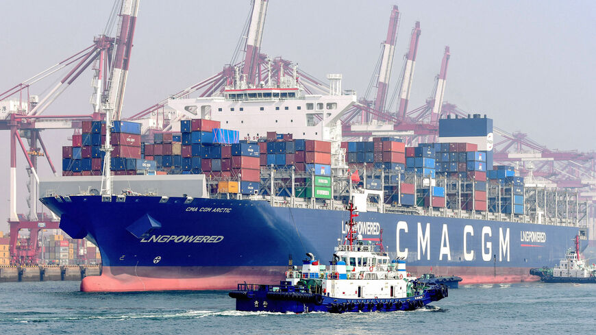 This photo taken on March 7, 2023 shows a cargo ship powered by LNG (Liquefied Natural Gas) loaded with containers at a port in Qingdao, in China's eastern Shandong province. (Photo by AFP) / China OUT (Photo by STR/AFP via Getty Images)