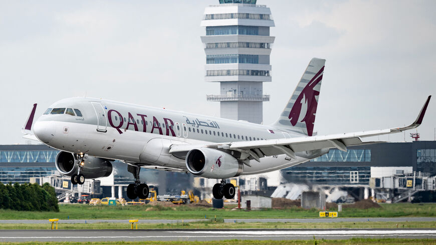 This photograph taken on June 7, 2023, shows an Qatar Airways Airbus A320 aircraft landing at the newly opened runway of Belgrade Nikola Tesla airport. The opening of Belgrade airport's new runway marked the completion of one of the major infrastructure projects undertaken by French operator Vinci, since taking over the concession in late 2018. (Photo by Andrej ISAKOVIC / AFP) (Photo by ANDREJ ISAKOVIC/AFP via Getty Images)