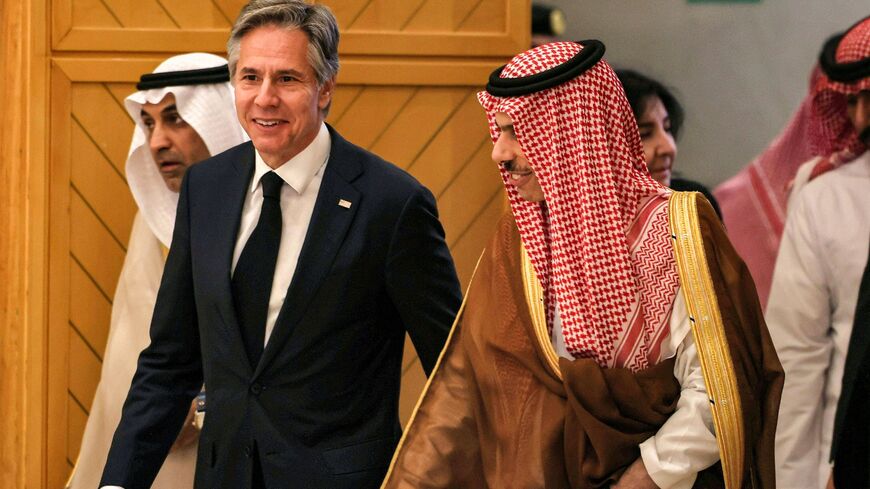 Saudi Foreign Minister Faisal bin Farhan (R) escorts US Secretary of State Antony Blinken as they arrive for a meeting with GCC Ministers at the GCC Secretariat in Riyadh on June 7, 2023.