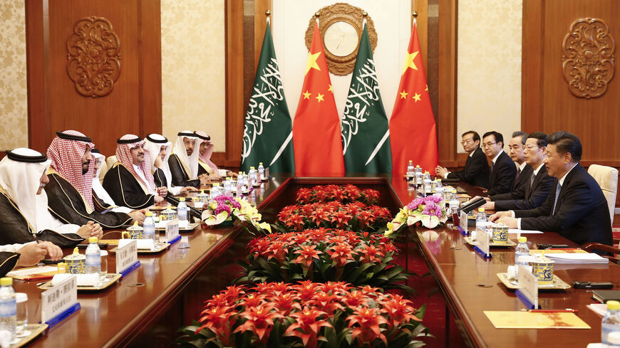 Saudi Arabia Deputy Crown Prince Mohammed bin Salman (2L) and Chinese President Xi Jinping (R).