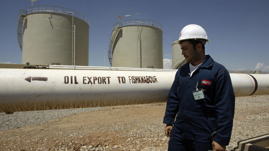 A worker is seen at the Tawke oil refinery near the village of Zacho, in the autonomous Iraqi Kurdistan Region, May 31, 2009.