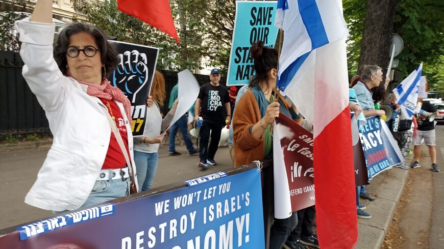 Anti-Judicial overhaul demonstrators protest against the arrival of Israel's Finance Minister Bezalel Smotrich, outside the OECD headquarters, June 7 2023