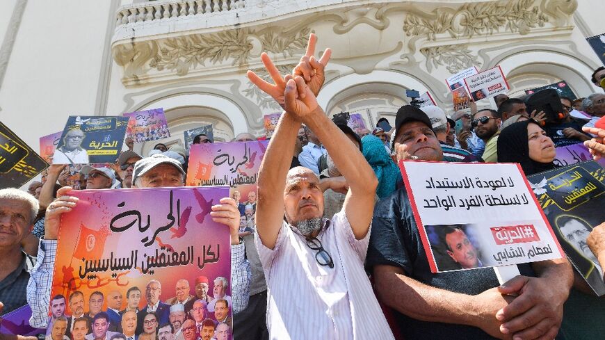 Protesters carried photographs of what they called the 'political prisoners' detained in Tunisia