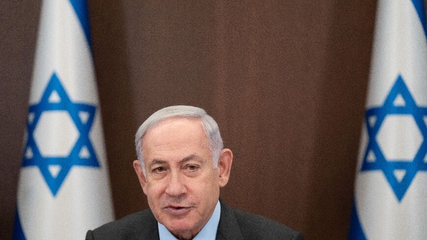 Israel's Prime Minister Benjamin Netanyahu chairing a weekly cabinet meeting