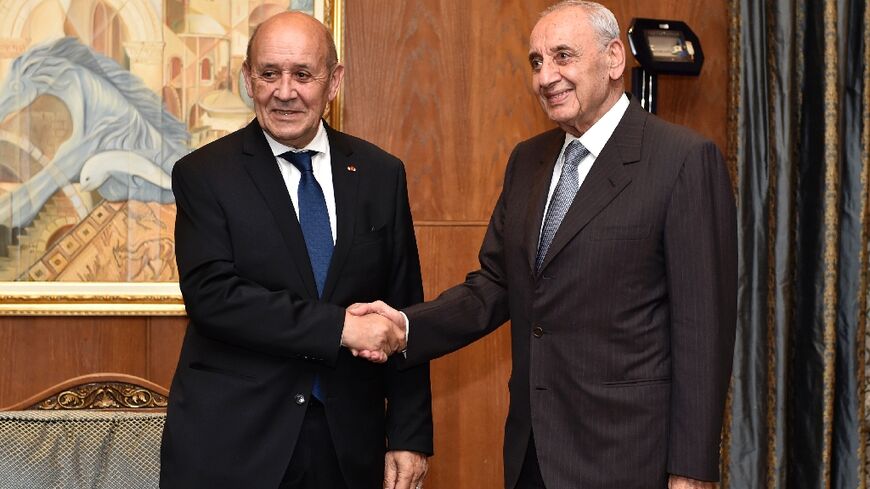 Lebanon's parliament speaker Nabih Berri (R) receives French special envoy Jean-Yves Le Drian in Beirut