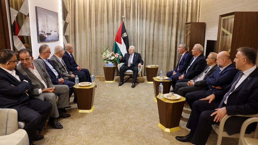 Palestinian president Mahmud Abbas (C) meeting with a delegation of the Popular Front for the Liberation of Palestine ahead of talks in El Alamein