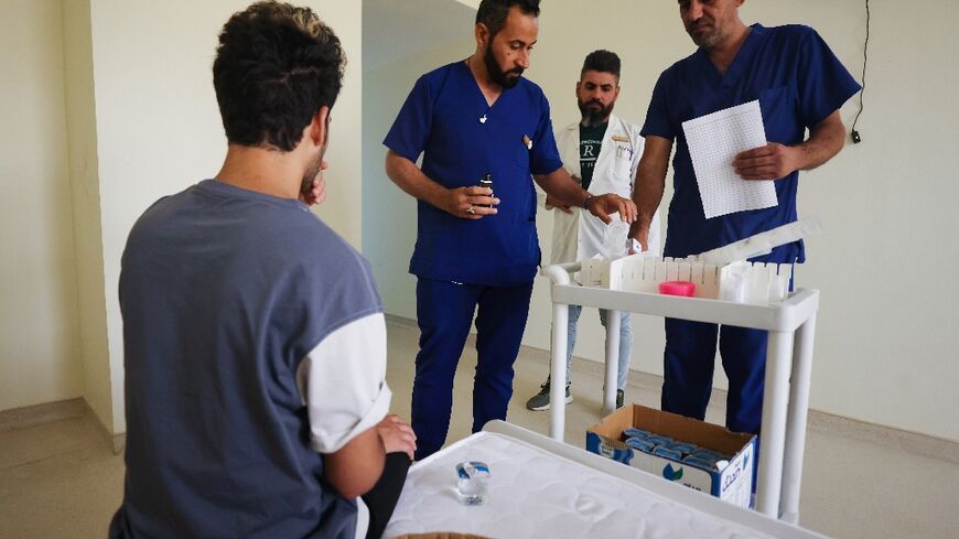 Some 40 patients are treated at Al-Canal Center for Social Rehabilitation in Baghdad amid a spike in drug abuse