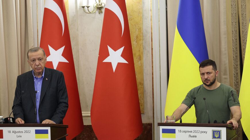 Turkish President Recep Tayyip Erdogan (L) and Ukrainian President Volodymyr Zelensky react while giving a press conference following the talks with UN Secretary-General Antonio Guterres in Lviv on Aug. 18, 2022, amid Russian invasion of Ukraine.