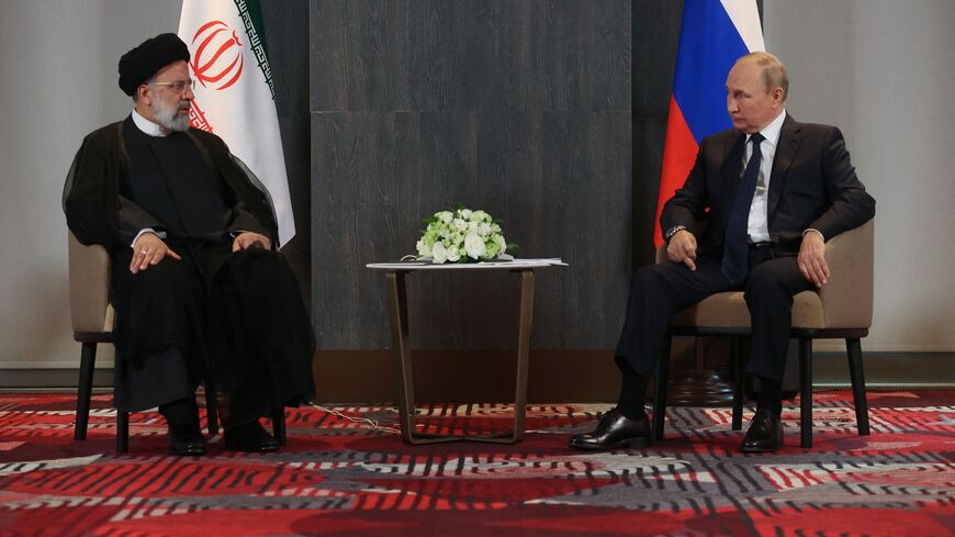 Russian President Vladimir Putin meets with his Iranian counterpart Ebrahim Raisi on the sidelines of the Shanghai Cooperation Organisation (SCO) leaders' summit in Samarkand on September 15, 2022. (Photo by Alexandr Demyanchuk / SPUTNIK / AFP) (Photo by ALEXANDR DEMYANCHUK/SPUTNIK/AFP via Getty Images)
